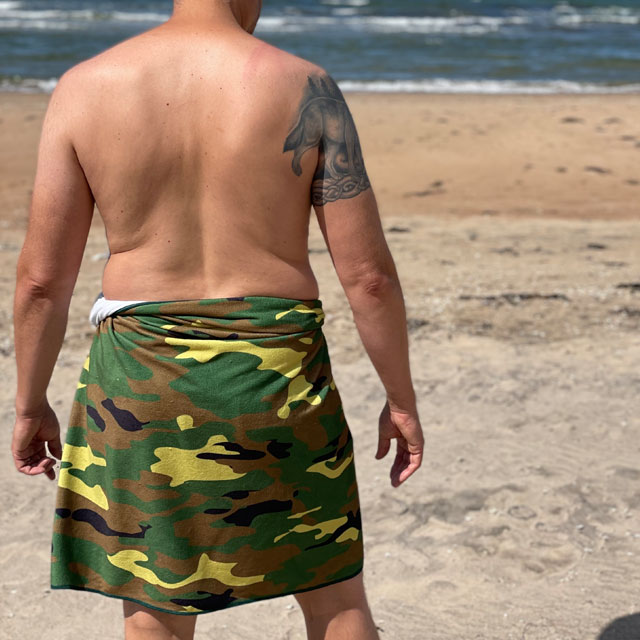 Towel Camouflage from TAC-UP GEAR wrapped around models waist on the beach