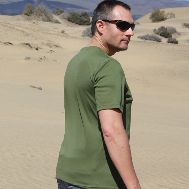 Right side view of a Training T-Shirt Green in sunny desert environment.
