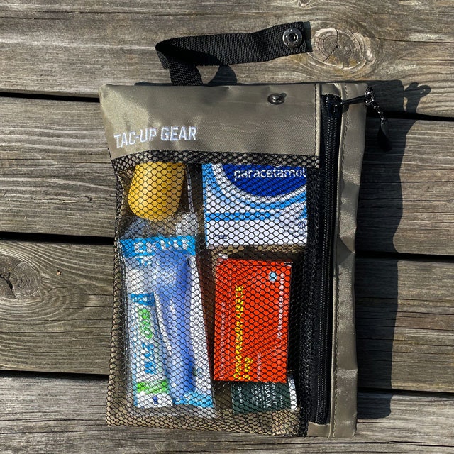 The flatband can be opened on a Zipper Net Pouch Khaki from TAC-UP GEAR