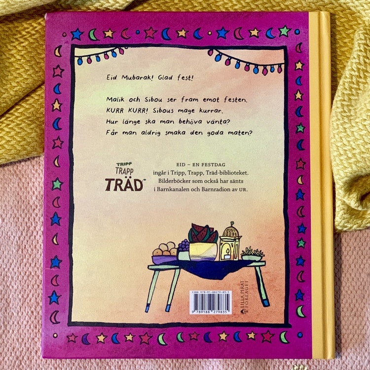 Barnbok Eid - en festmåltid, mångkulturell bok, mångfald bland karaktärerna där mörkhyade, muslimska personer är representerade. Andra kulturer berörs, firar Eid.