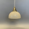 fin fonsterlampa med gult glas tygsladd