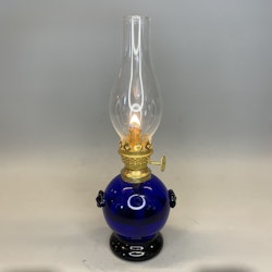 Mörkblå liten klotlampa i glas