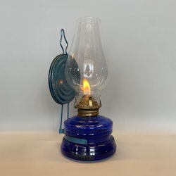 Liten blå väggfotogenlampa med blå reflektor