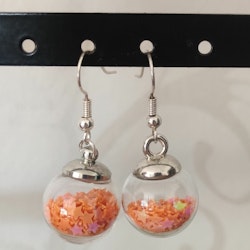 Örhängen glasglob med orange stjärnglitter