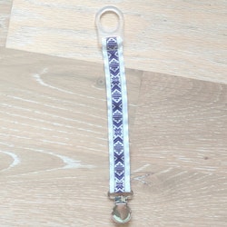 Napphållare med lila dräktband