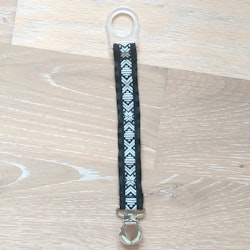 Napphållare med svart dräktband