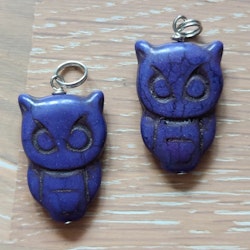 Berlock uggla i howlite
