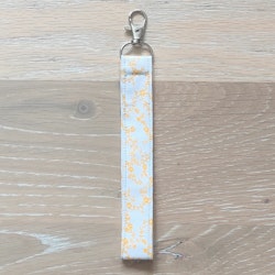 Kort nyckelband gul blomranka med karbinhake
