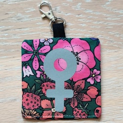 Reflex kvinnosymbol på rosa och rött blommigt nr.27