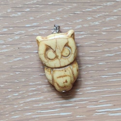 Berlock uggla i howlite