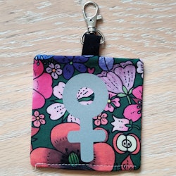 Reflex kvinnosymbol på rosa och rött blommigt nr.27