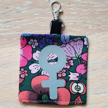 Reflex kvinnosymbol på rosa och rött blommigt nr.27