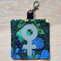 Reflex kvinnosymbol på grön och blå blommigt nr.29