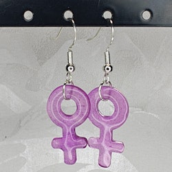 Örhängen med små kvinnosymboler i purple