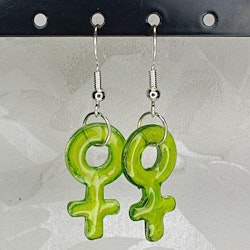 Örhängen med små kvinnosymboler i bright green