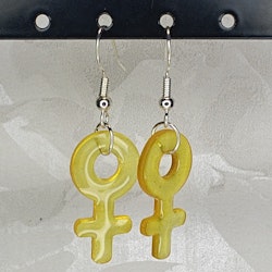 Örhängen med små kvinnosymboler i tulip yellow