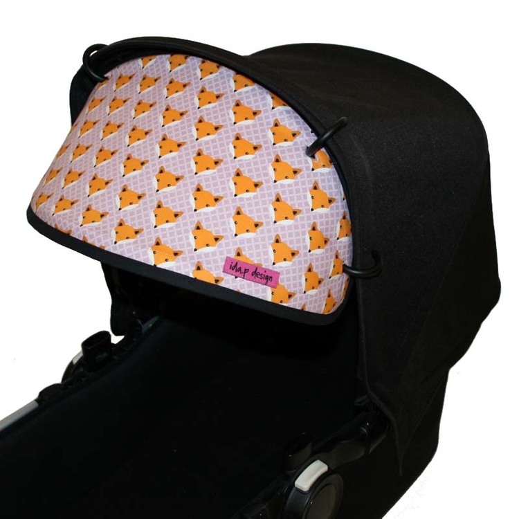 Solskydd barnvagn i rosa lila med rävar på