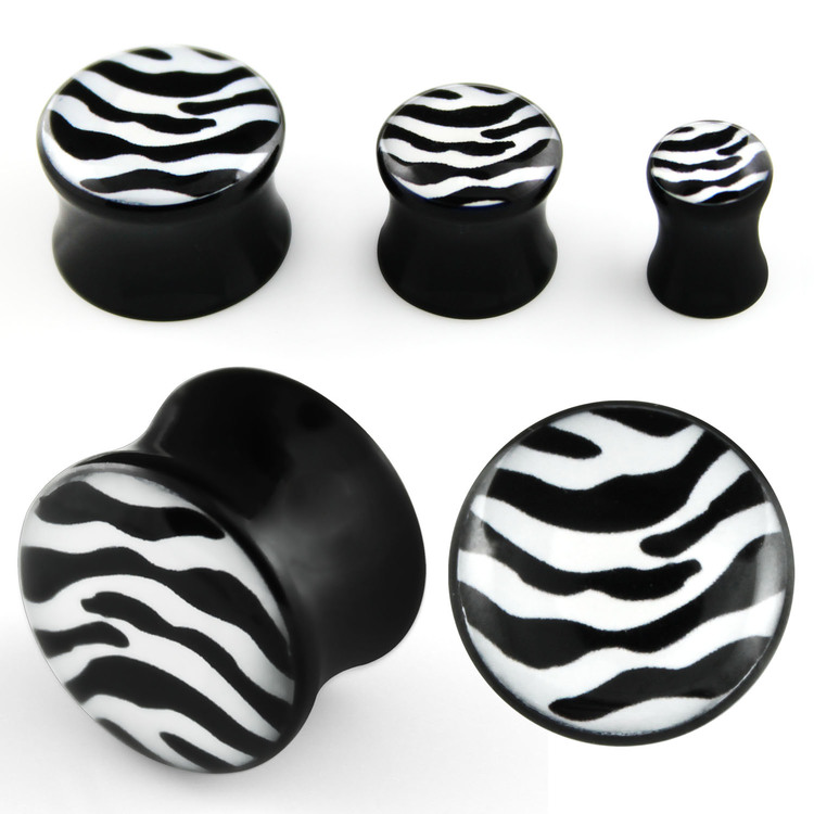 Akrylplugg med svart och vitt zebramönster