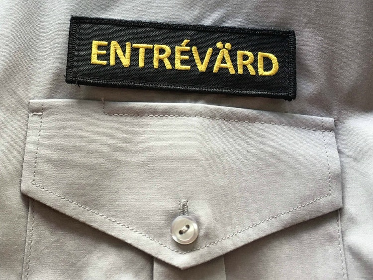 Emblem Entrévärd, broderat med eller utan kardborre