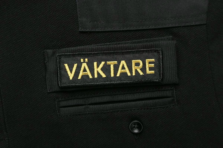 Robust Väktare Hundförarpiké med kort ärm i Svart