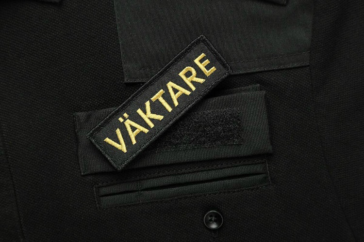 Robust Väktare Hundförarpiké med kort ärm i Svart