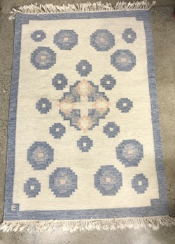 CARPET, red cloth, signed E.