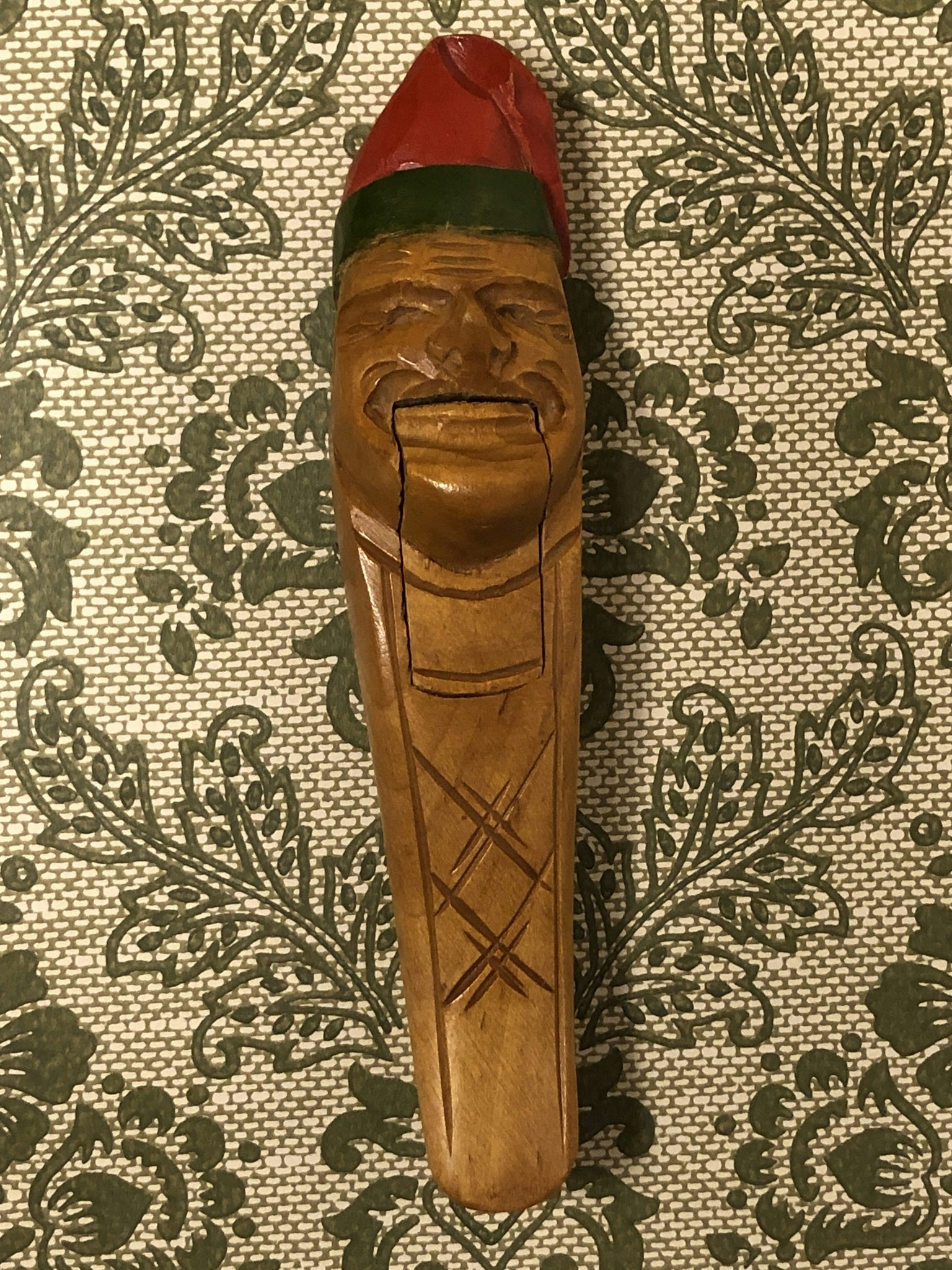 NUTS CRUSHER, wood, old man with red hood, 1900s.