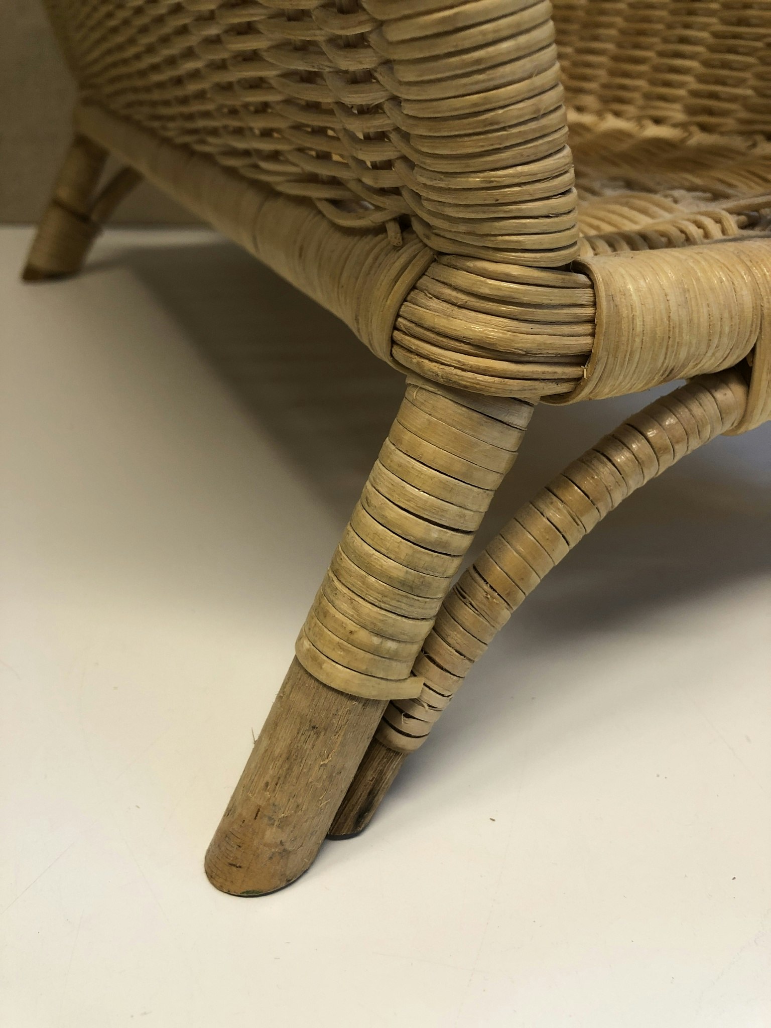 NEWSPAPER BASKET, rattan, second half of the 20th century.