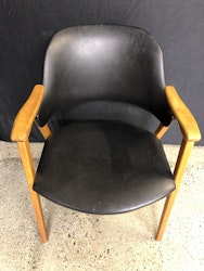 ARMCHAIR, beech, black imitation leather, 1960s/70s.