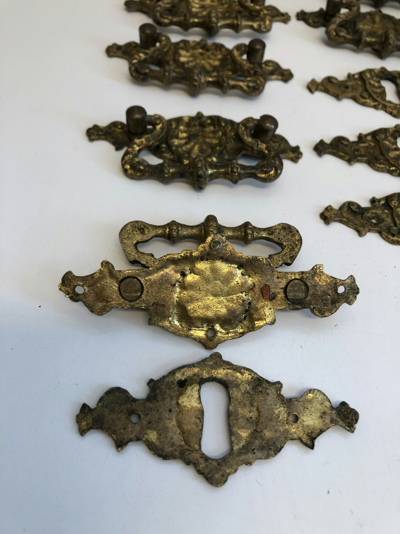 FURNITURE FITTINGS, 11 pieces, bronzed brass, neo-Renaissance, 18th/19th century.