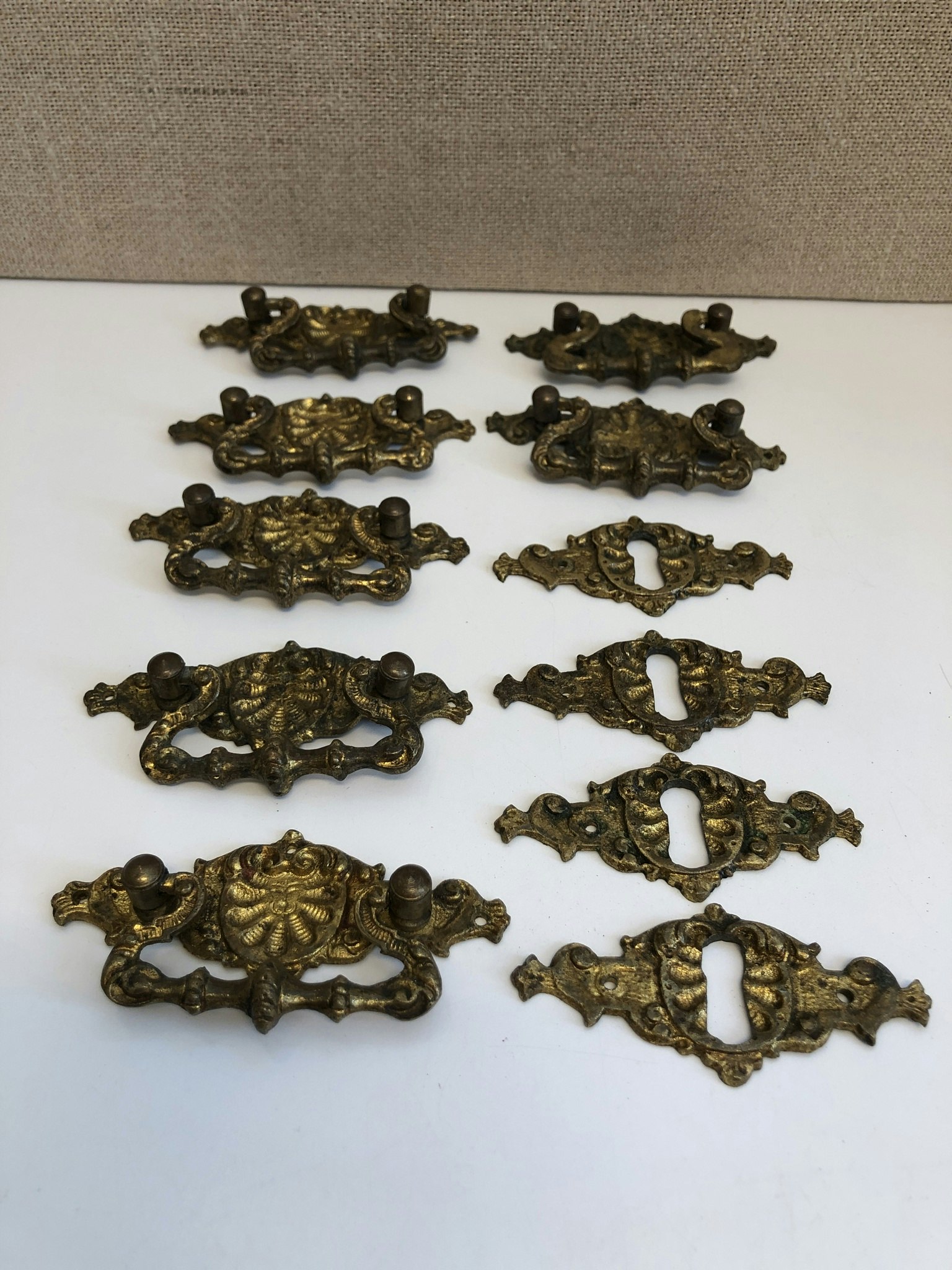 FURNITURE FITTINGS, 11 pieces, bronzed brass, neo-Renaissance, 18th/19th century.