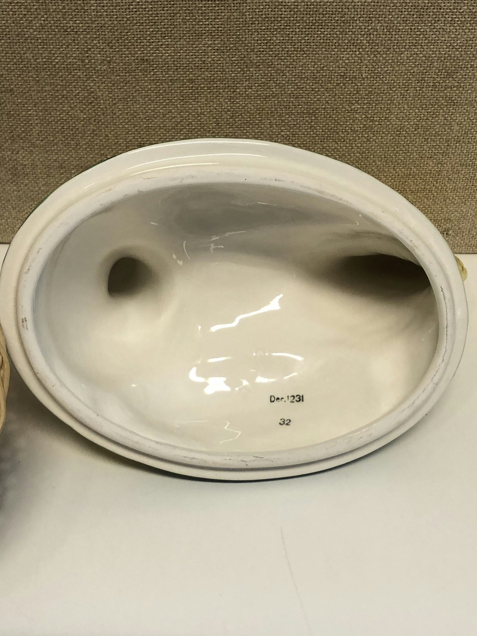 LAYING HEN, porcelain/rattan, second half of the 20th century.