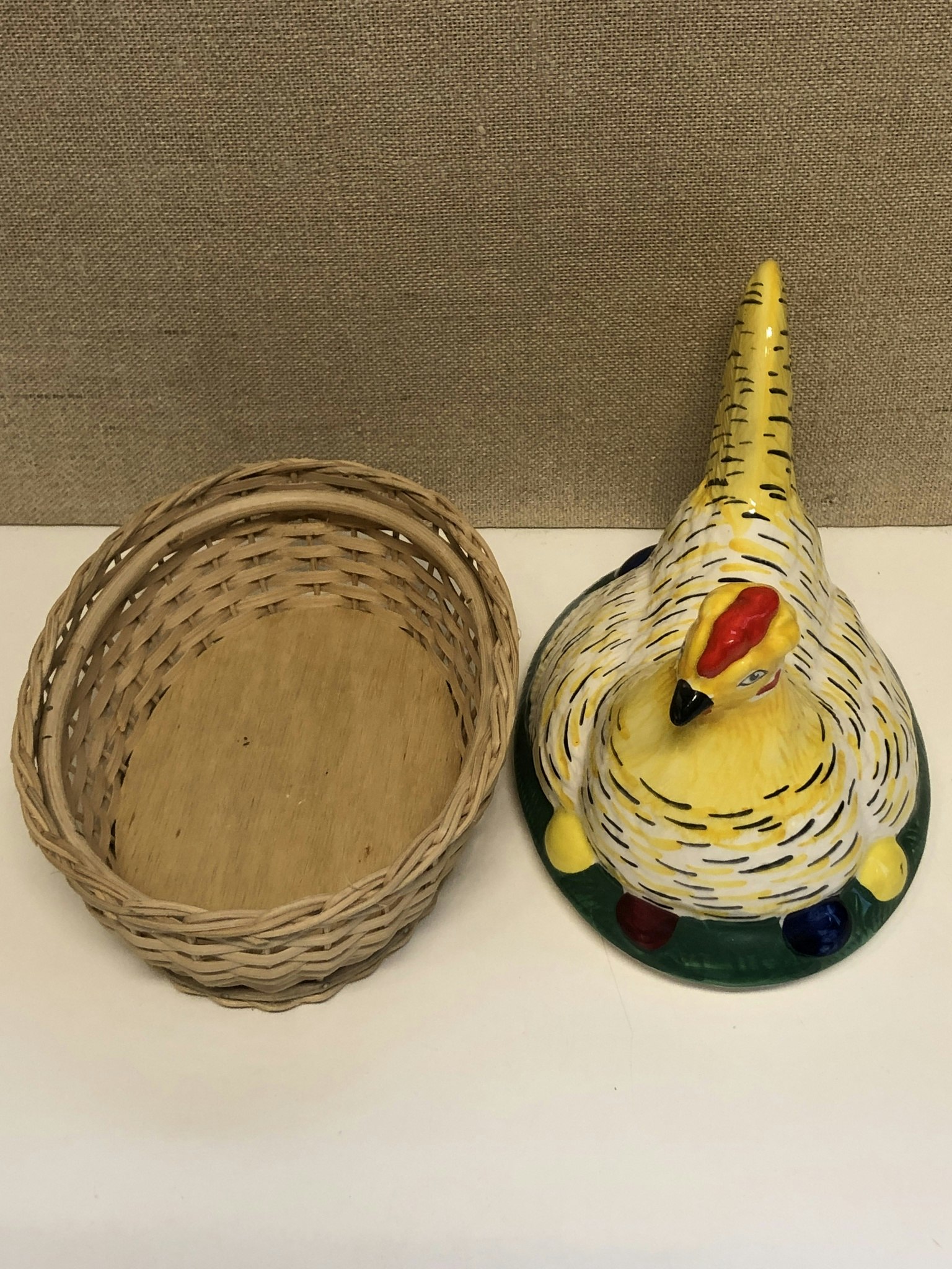 LAYING HEN, porcelain/rattan, second half of the 20th century.