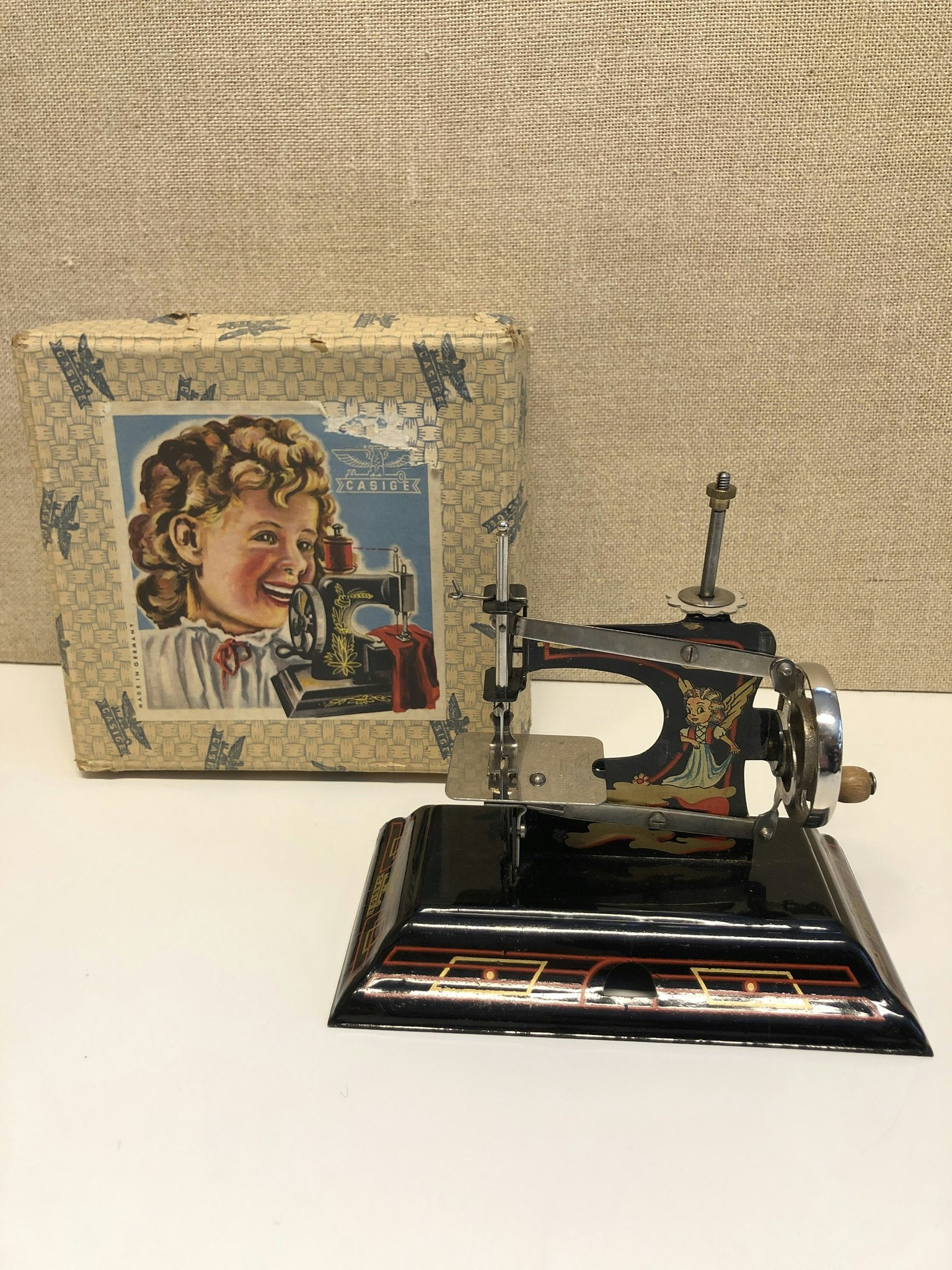 SEWING MACHINE, metal, children's model, original box, Casige, Germany, first half of the 20th century.