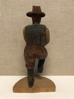 TRÄSKULPTUR, Cowboy, signerad E.D. 1940-tal
