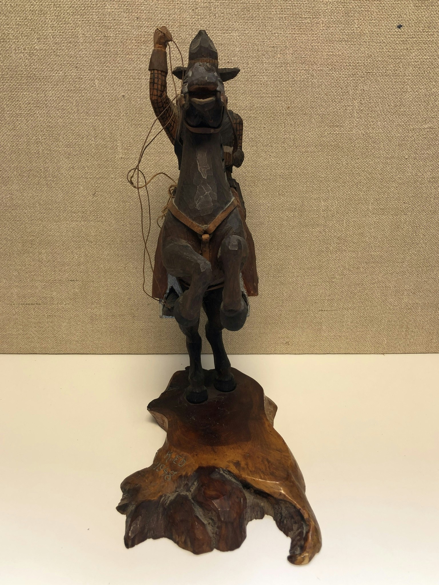 WOODEN SCULPTURE, Cowboy, signed KED 1948.