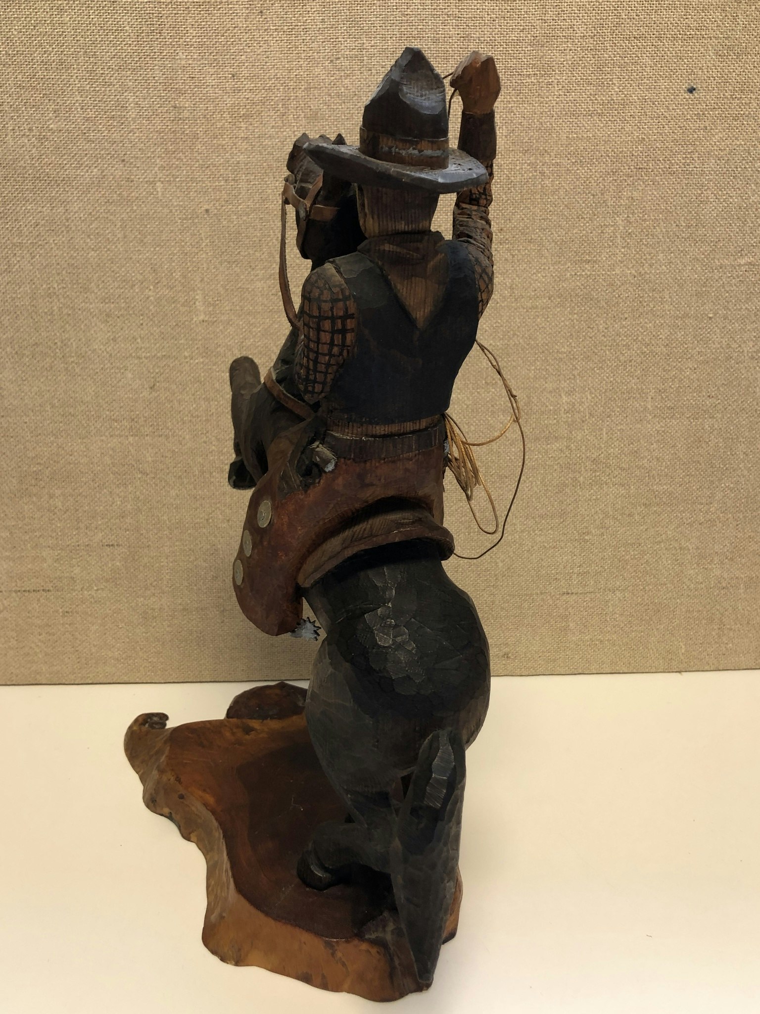 WOODEN SCULPTURE, Cowboy, signed KED 1948.