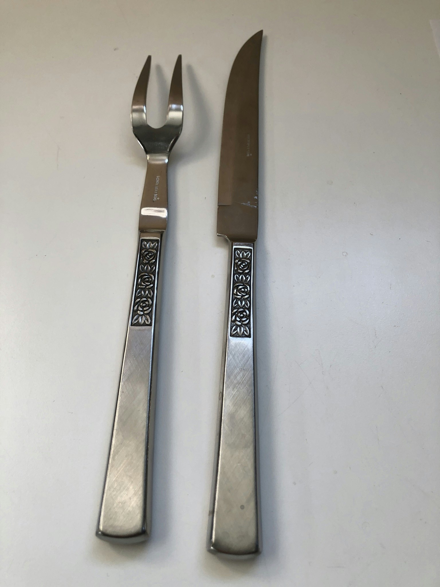 TRANCHERBESTICK, rostfritt stål, "Rosen", Åhlens, 1960/70-tal.