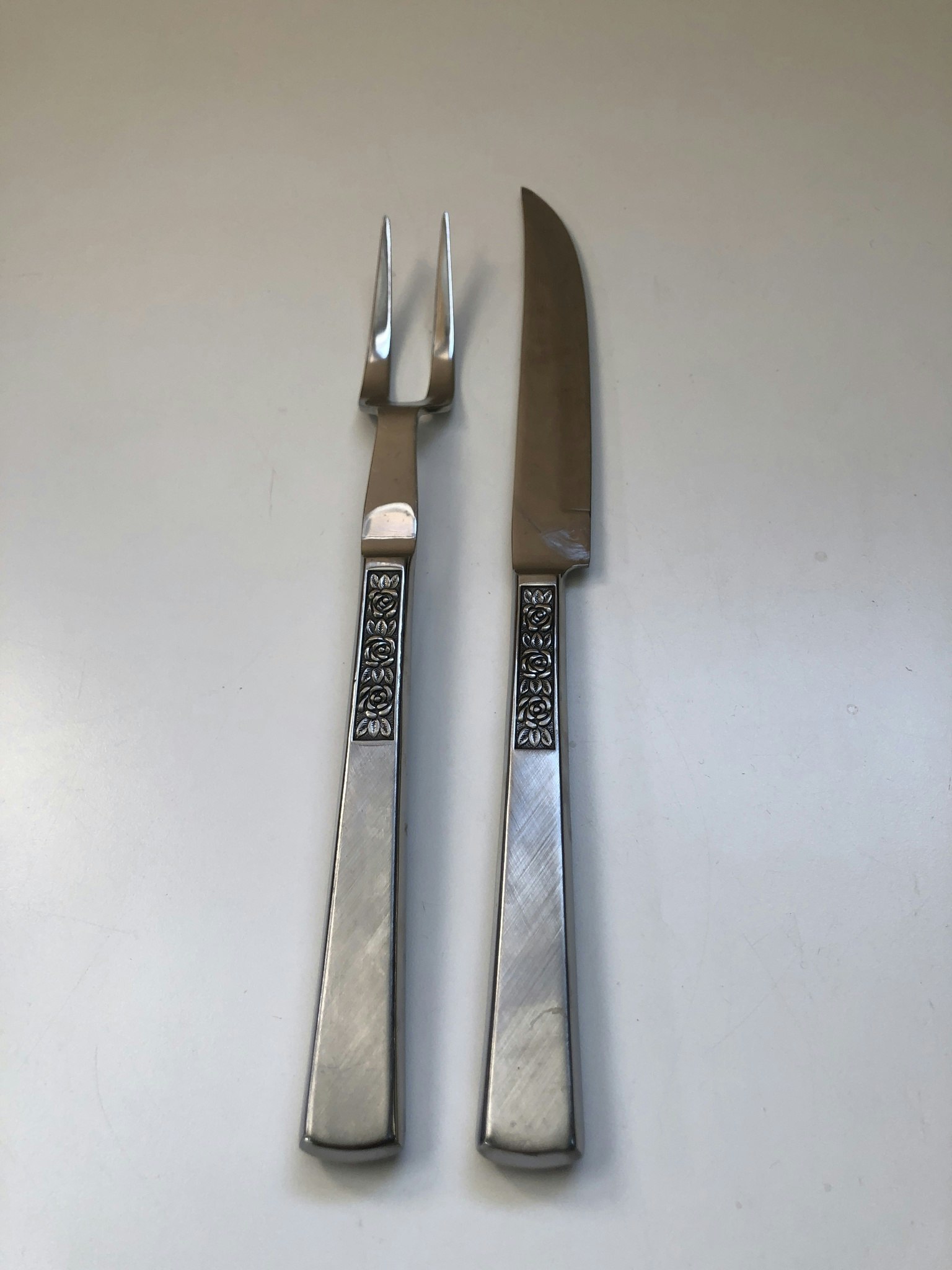 TRANCHERBESTICK, rostfritt stål, "Rosen", Åhlens, 1960/70-tal.