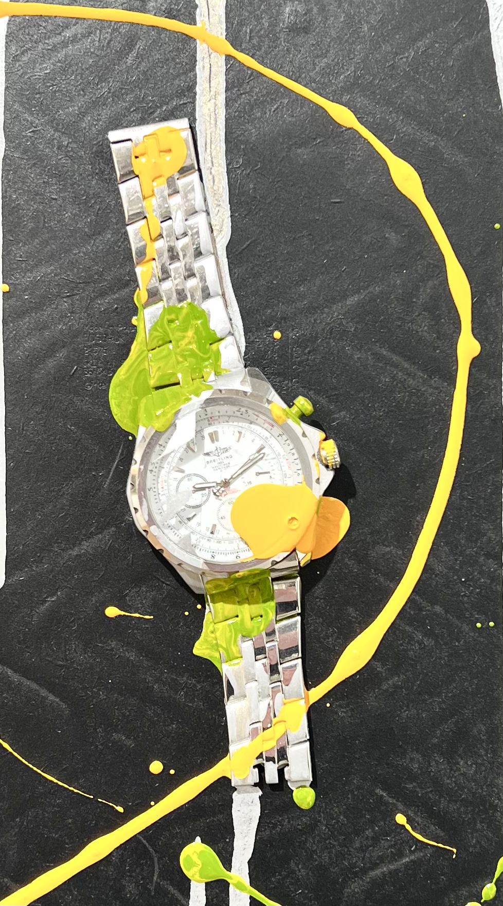 "Waste of time" Blandteknik med klocka av Adam Ström. 35x25 cm