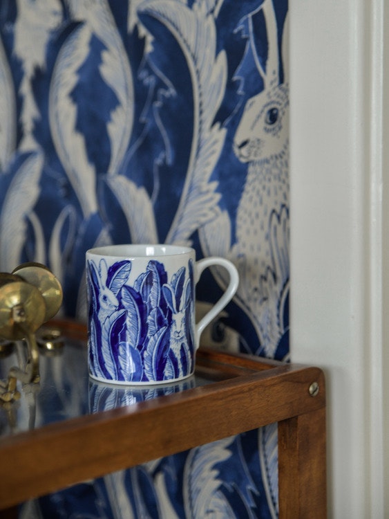 Hares in hiding mug blue