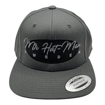 YP6606 Classic Snapback Dark Grey with a black front oval and light grey text