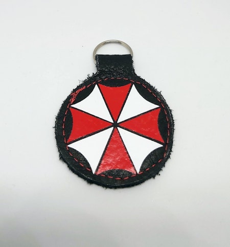 Tryckt nyckelring - Umbrella Corporation