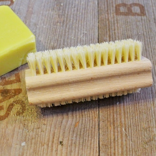 Wooden nail brush with natural fiber