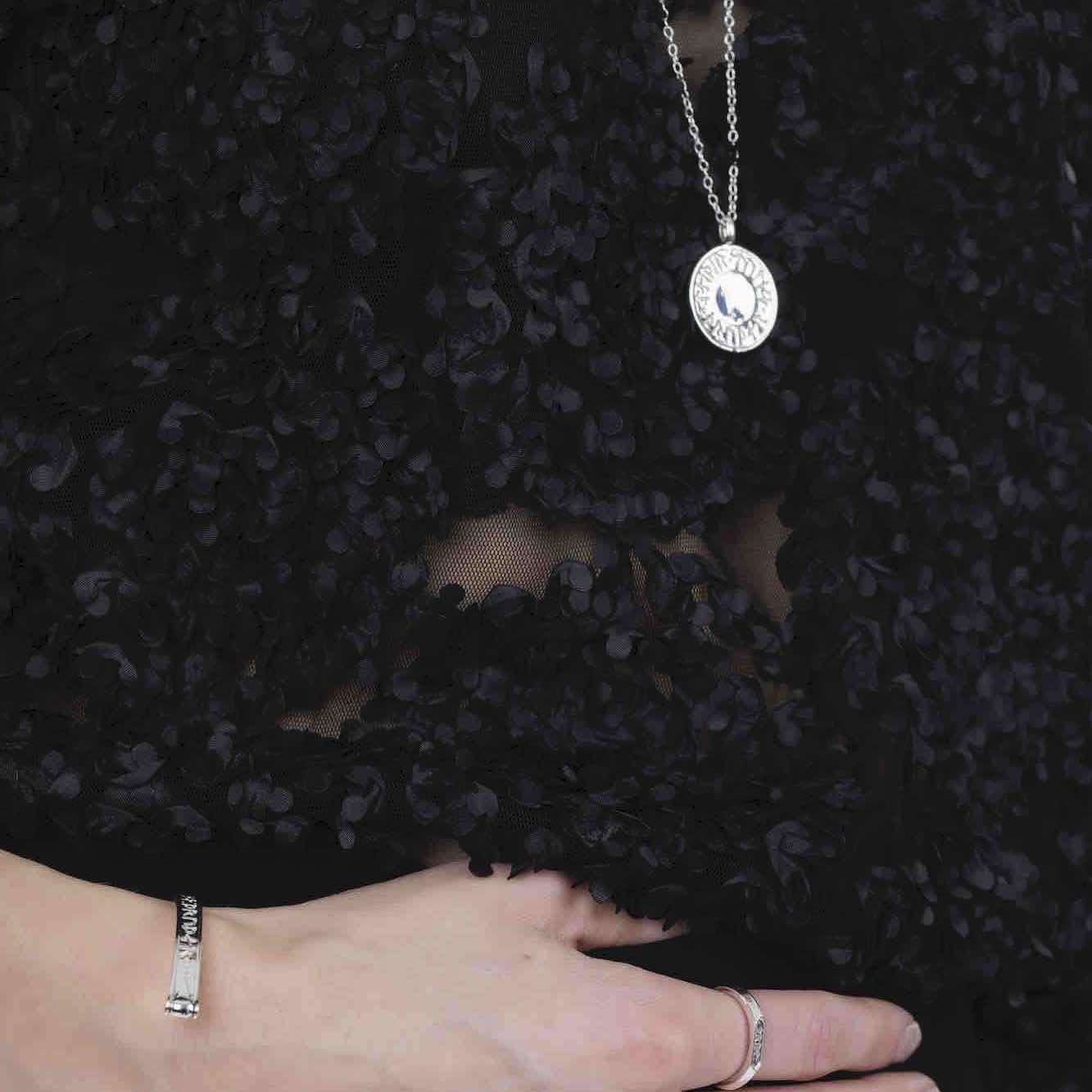 Soldiser Goddess Thrud Silver Rune Necklace and Bracelet on woman