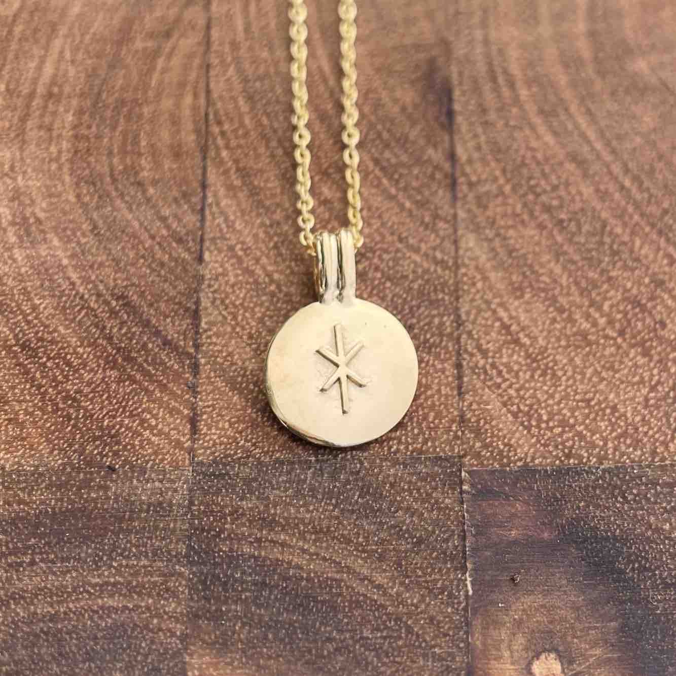 Soldiser Rune Pendant Hagall Gold Necklace on Wood
