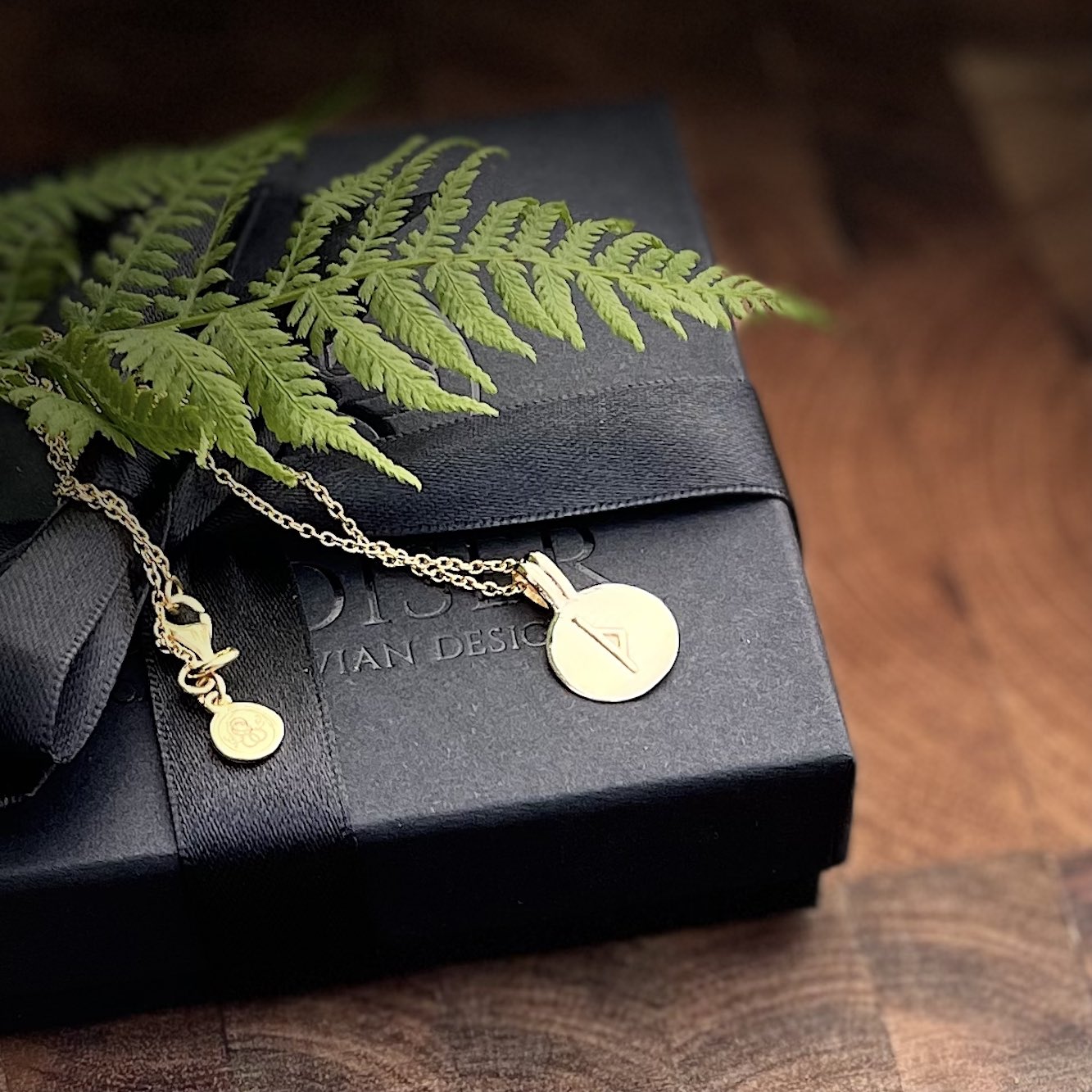 Soldiser Rune Pendant Thurs Gold Necklace on Gift Box with Fern