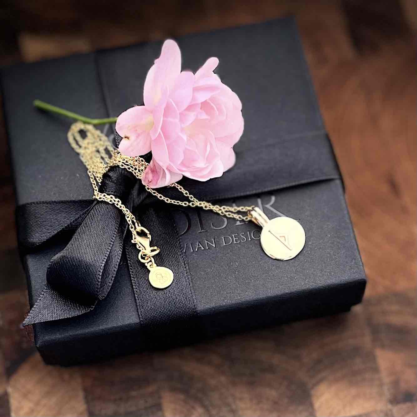 Soldiser Rune Pendant Thurs Gold Necklace on Gift Box with Flower