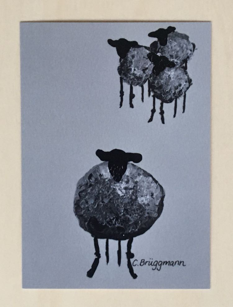 Konstnärligt vykort i A6-storlek med fyra söta små grå får. Fårmotivet är målat av C.Brüggmann.