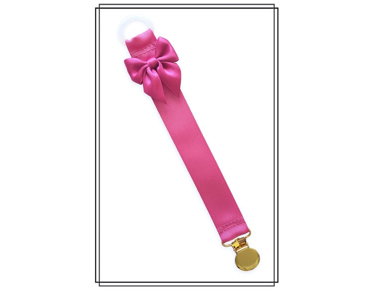 Cerise napphållare med rosett - guld